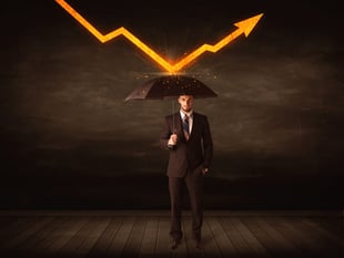 Businessman standing with umbrella keeping orange arrow concept on background