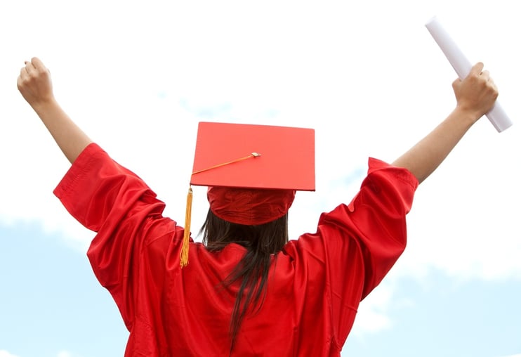 Graduate student celebrating her academic success.jpeg