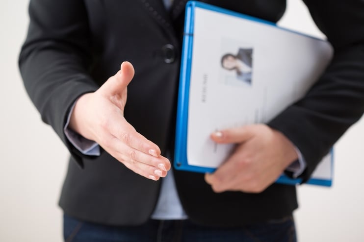 Horizontal view of woman with her curriculum vitae.jpeg