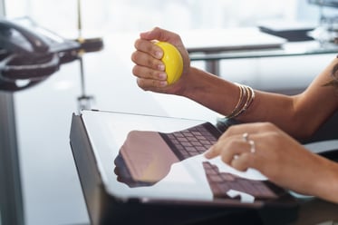 stressed-office-worker-with-anti-stress-ball-types-2021-08-26-15-46-10-utc