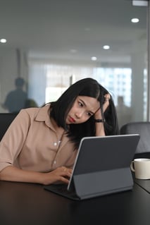 young-businesswoman-sitting-with-computer-tablet-a-2021-10-11-15-12-10-utc